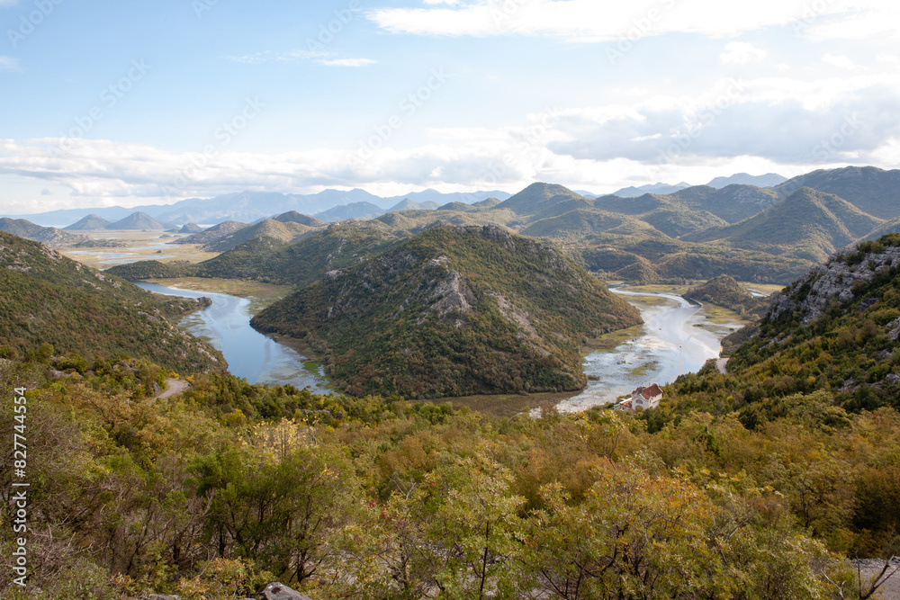 Fototapeta premium Mountain landscape with Crnojevica river in Skadar Lake National Park, Montenegro for publication, poster, calendar, post, screensaver, wallpaper, postcard, cover, website. High quality photo