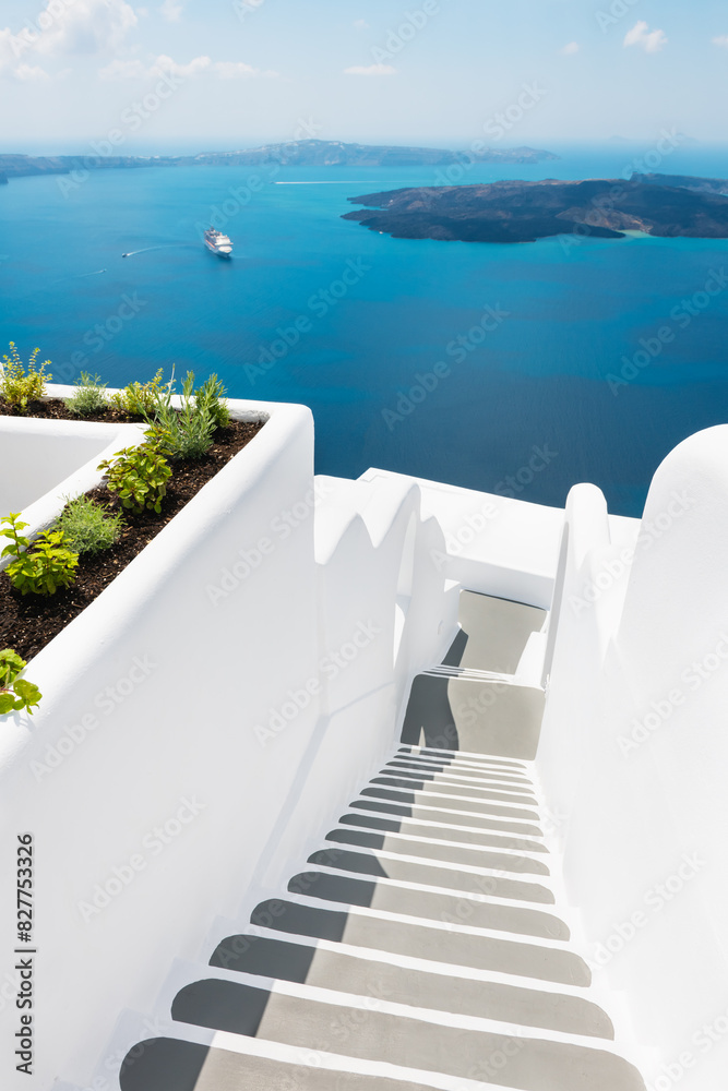 White architecture in Santorini island, Greece. Stairs to the sea.
