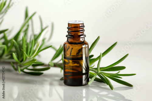 Rosemary aromatherapy essential oils in dark glass bottle	
