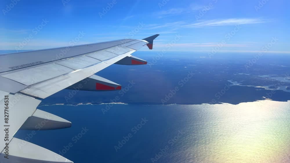 Flying over Sydney NSW airport heading to Melbourne Victoria VIC Australia early winner morning sunrise on the horizon Flying over Sydney NSW airport heading to Melbourne Victoria VIC Australia early winner morning sunrise on the horizon