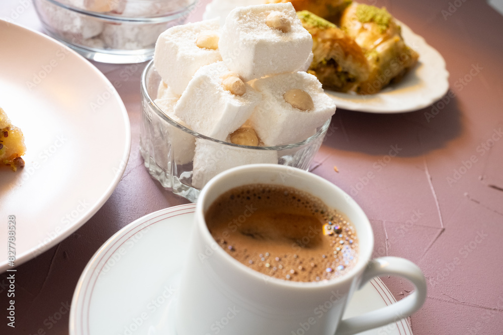 baklavas, Turkish coffee and Turkish delights on pink background baklavas, Turkish coffee and Turkish delights on pink background