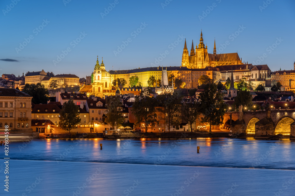 Charles bridge (Karlův most) and Hradcany castle hill over Vltava in the night, Prague, Czech Republic