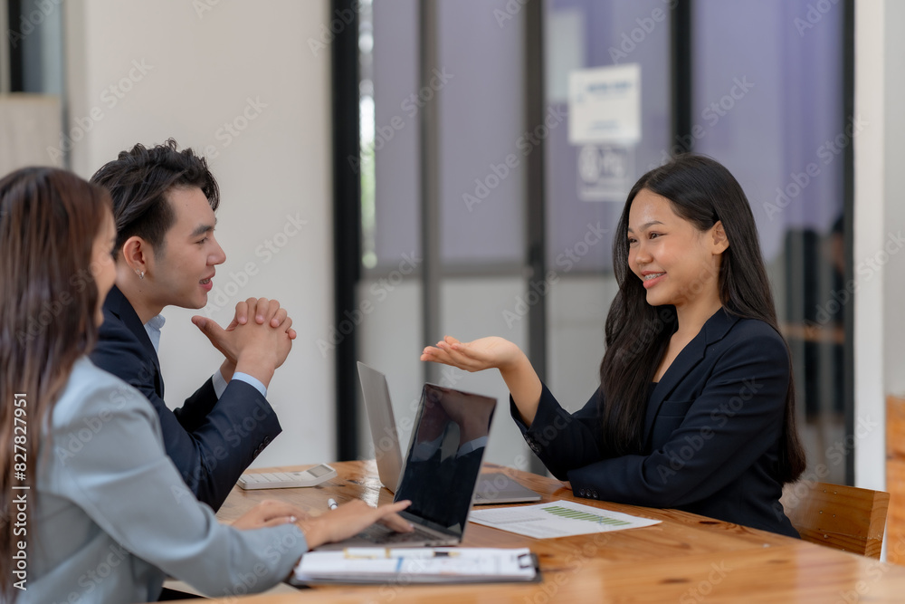 Business meeting with three professionals discussing ideas in a modern office, showcasing teamwork, collaboration, and professional interaction. Business meeting with three professionals discussing ideas in a modern office, showcasing teamwork, collaboration, and professional interaction.