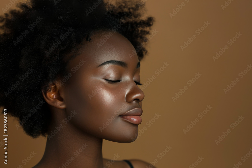A close up of a black woman's face with her eyes closed looking to a side A close up of a black woman's face with her eyes closed looking to a side
