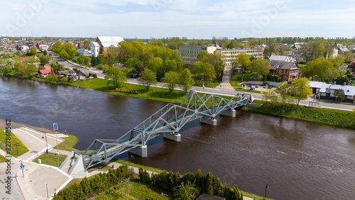 Pedestrian Bridge over Nevezis River in Kedainiai, Lithuania, Aerial Drone View photo