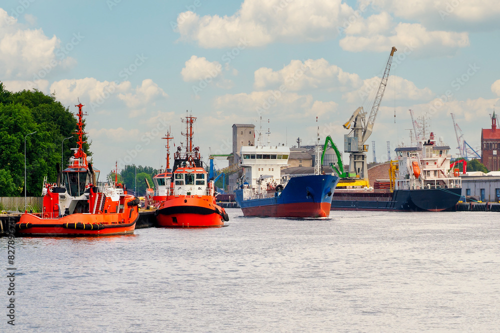 Port of Gdansk, Poland, Baltic Sea, port tugs on the left, Bunkering Tanker ANGON is sailing