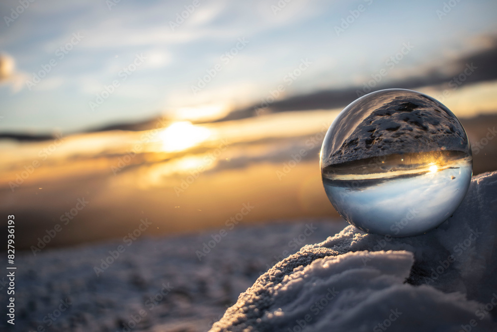 the sun's rays are reflected in the crystal ball in the winter aura the sun's rays are reflected in the crystal ball in the winter aura