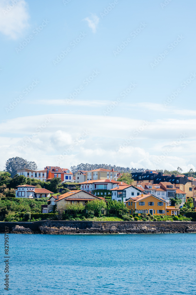 Fototapeta premium Panoramic view of a famous tourist attraction Calo del Moro Beach by the coast in Spain. Beautiful rocky beach with blue water on a sunny day.