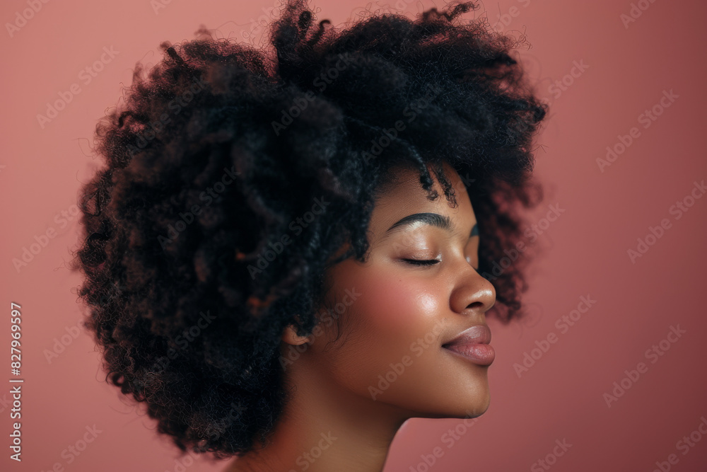 A close up of a black woman's face with her eyes closed looking to a side A close up of a black woman's face with her eyes closed looking to a side