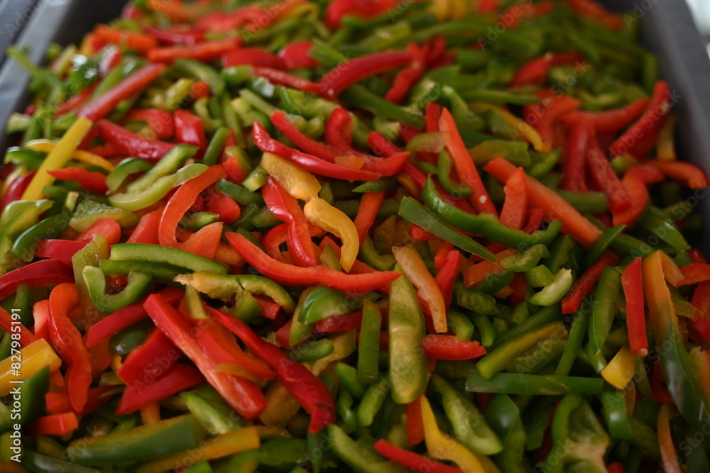 pimientos de tres colores, rojo, verde y amarillo en rajas pimientos de tres colores, rojo, verde y amarillo en rajas
