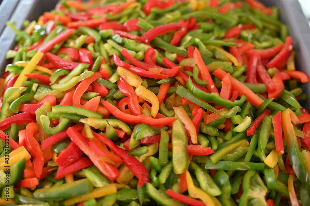 pimientos de tres colores, rojo, verde y amarillo en rajas pimientos de tres colores, rojo, verde y amarillo en rajas