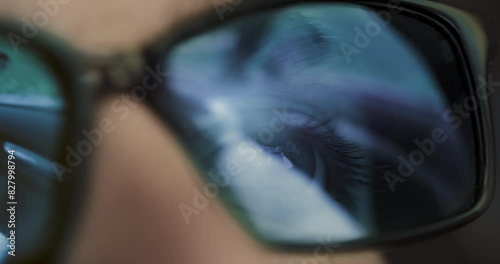 POV Businessman Wearing AR Smart Glasses Driving Fast A Luxury Car Reflection Moving Through City Space Travel Gaming Virtual Camera Tracking Shot Of Glasses Reflection Slow Motion Red Epic 8k photo