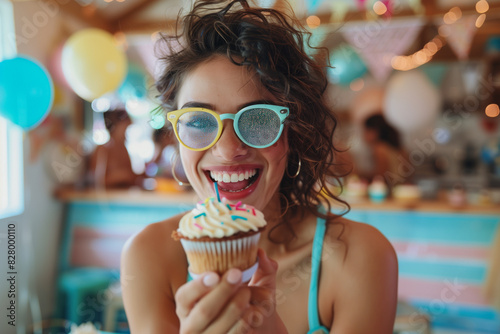 Woman Wearing Sunglasses Eating Cupcake