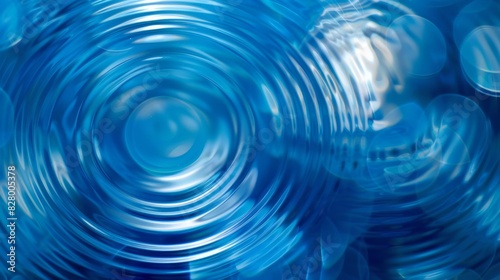 The image is of a blue wave with ripples in the water