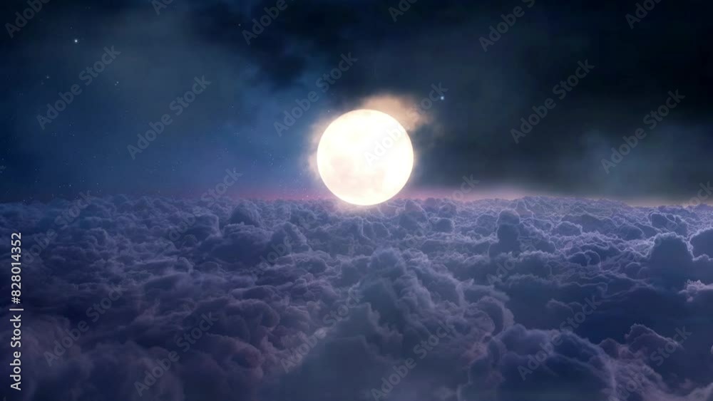 Full moon above dramatic clouds on a calm night