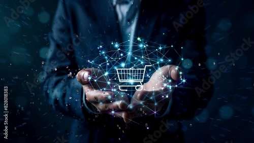 Businessman holding digital shopping cart icon with connections. Futuristic digital interface