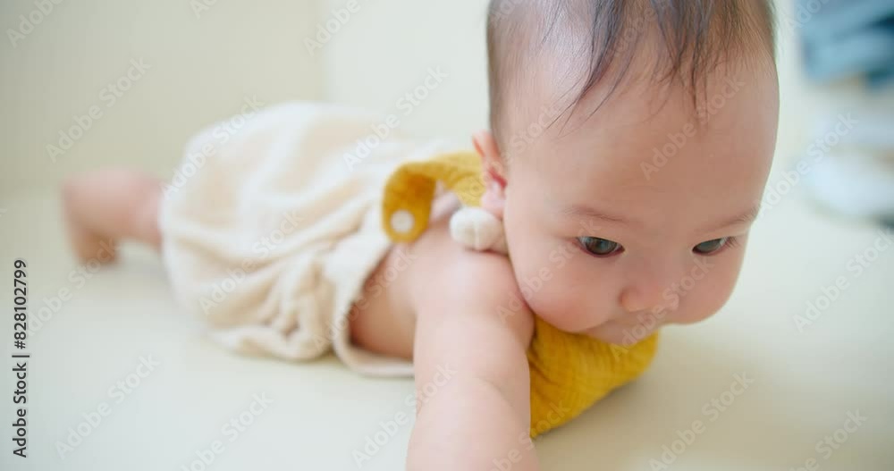 A close-up of an adorable baby crawling reaches forward with curiosity, highlighting early developmental stages. Perfect for parenting and child development themes. A close-up of an adorable baby crawling reaches forward with curiosity, highlighting early developmental stages. Perfect for parenting and child development themes.