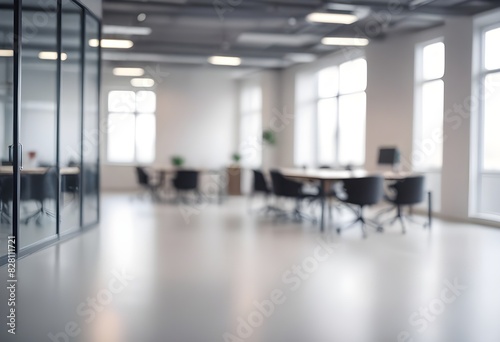 Modern office with desk and window. Blurred background.  © Gia