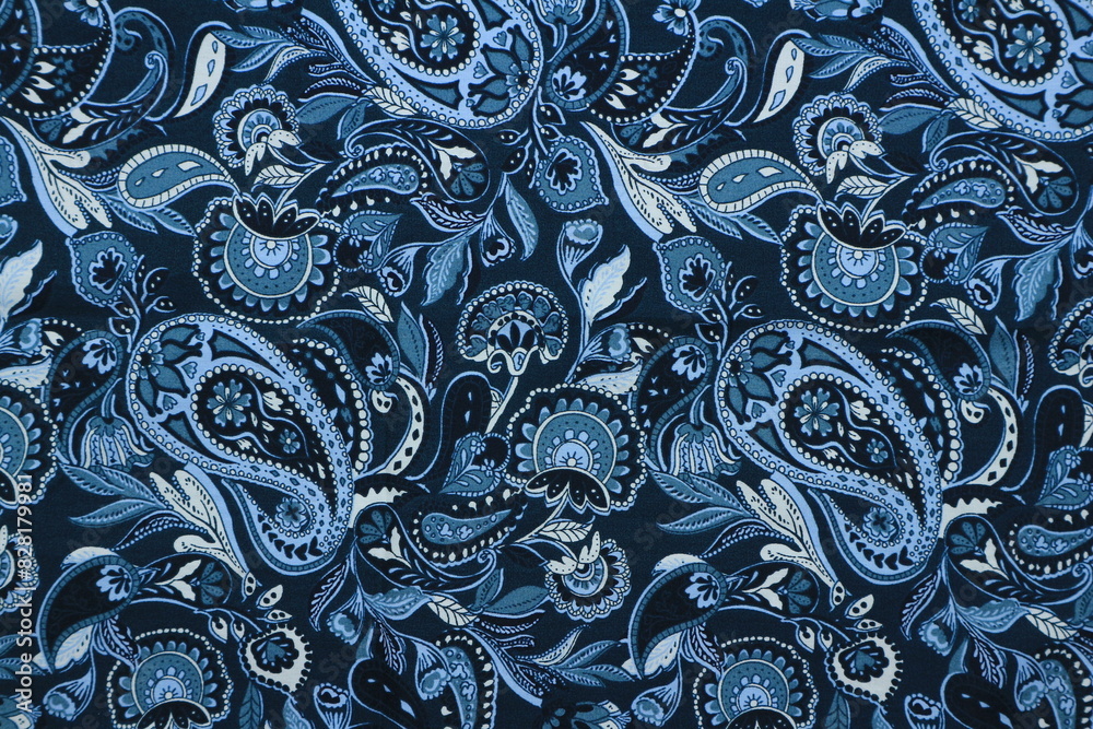 Navy paisley pattern fabric background Navy paisley pattern fabric background