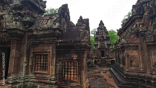 Wide Shot Stabilized Move Tracking through Angkorean Temple, Banteay Srei, Cambodia photo