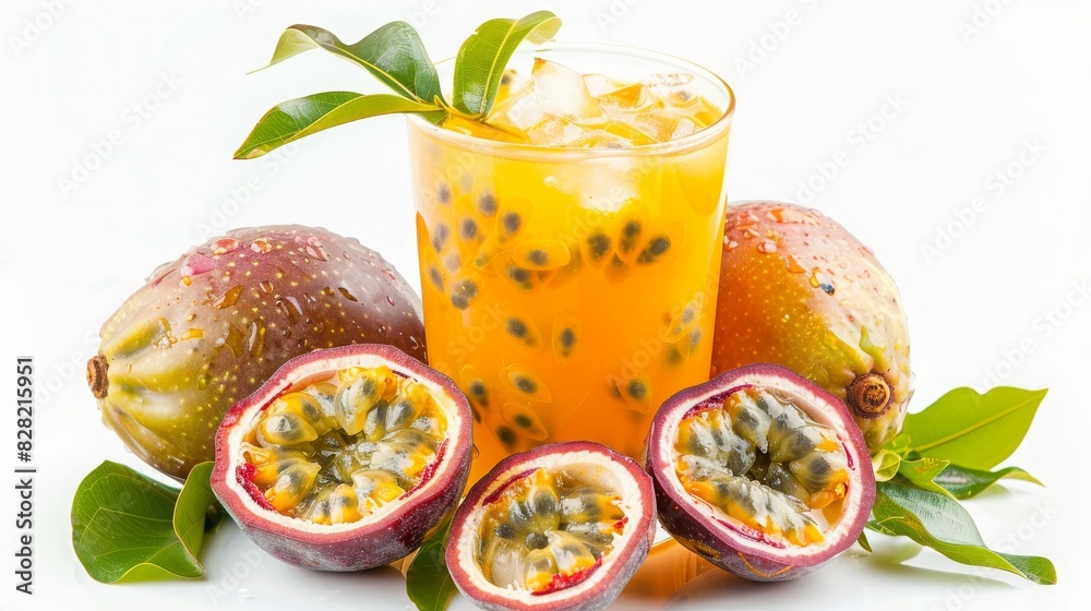 Clear glass of passion fruit iced tea with whole and sliced passion fruits, isolated on a pristine white background Clear glass of passion fruit iced tea with whole and sliced passion fruits, isolated on a pristine white background