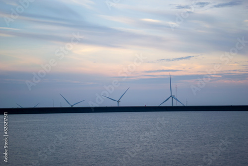 wind turbines produce electricity, clean energy.