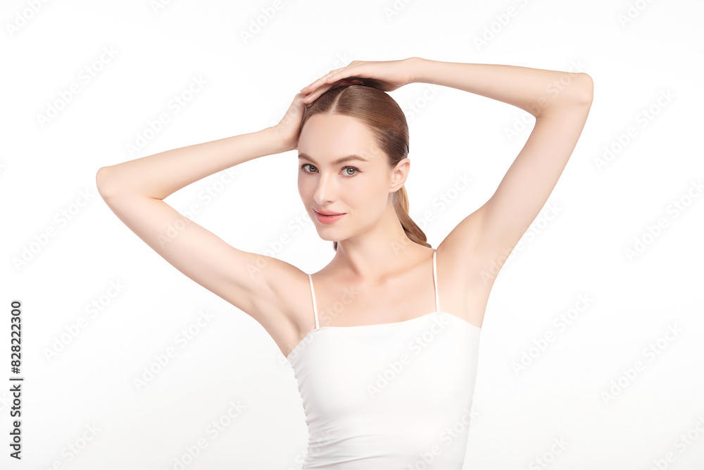Beautiful Young woman lifting hands up to show off clean and hygienic armpits or underarms on white background, Smooth armpit cleanliness and protection concept Beautiful Young woman lifting hands up to show off clean and hygienic armpits or underarms on white background, Smooth armpit cleanliness and protection concept