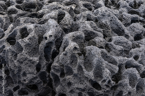Kaupo flow / Koko Rift basalts, Honolulu Volcanics . About 0.1 Million years ago. Geology of Oahu, Hawaii. Makapuu Beach Park Tafoni ( tafone ) cavities in salt weathering, salt wedging basalt .  


 photo