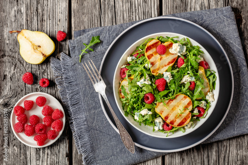 grilled pear salad with cheese, arugula, berries