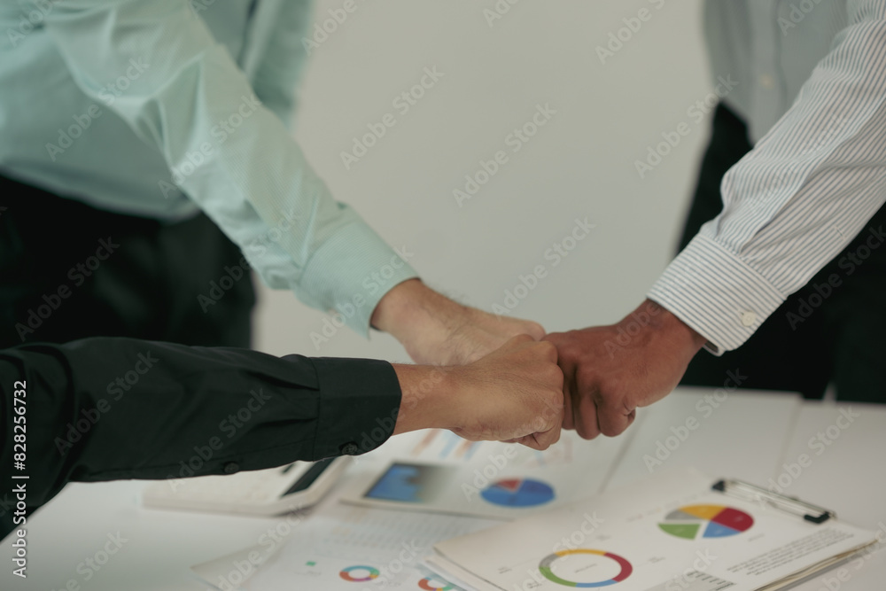 Businessman use hand to fist bump for success teamwork corporate Businessman use hand to fist bump for success teamwork corporate