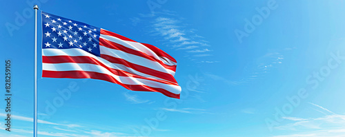  Detailed close-up of a high-resolution USA flag waving proudly against a clear blue sky.