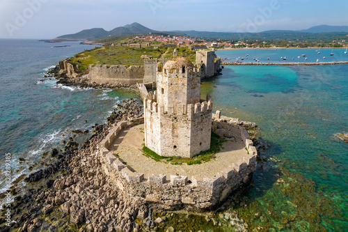 Aerial drone view of Methoni Castle with methoni village as a background   in Messinia, Greece photo