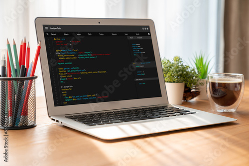 Software development programming on computer screen for modish application and program coding