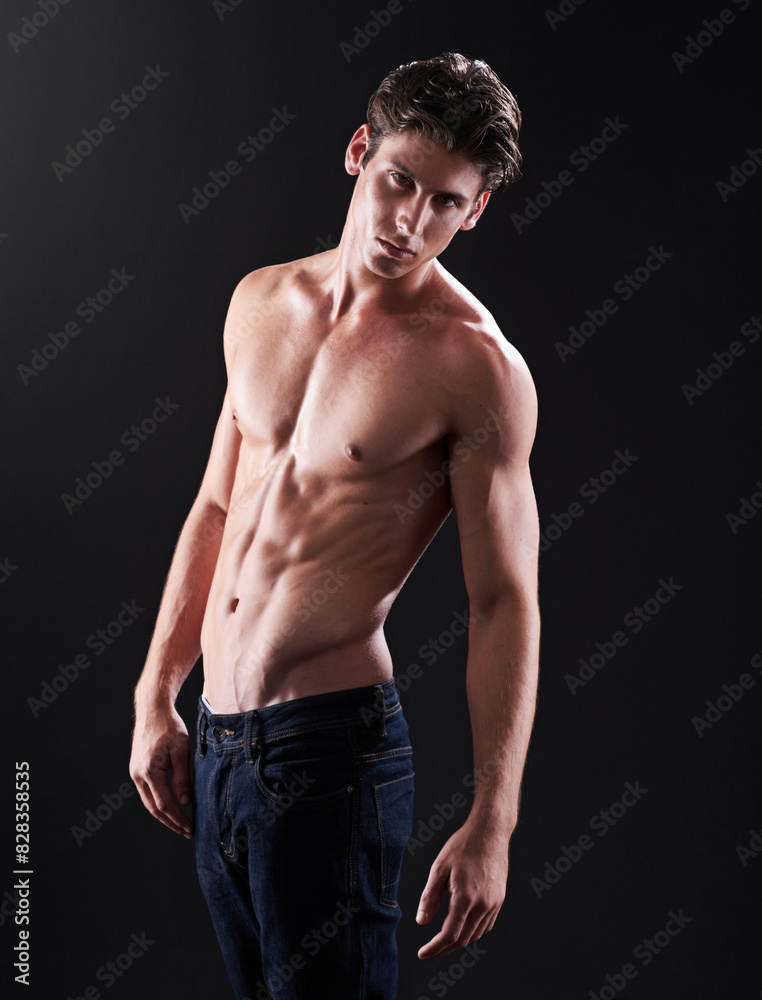 Body, portrait and strong man in studio with jeans for fitness, workout and wellness. Bodybuilder, male athlete and progress by black background for performance, training and confidence for exercise Body, portrait and strong man in studio with jeans for fitness, workout and wellness. Bodybuilder, male athlete and progress by black background for performance, training and confidence for exercise