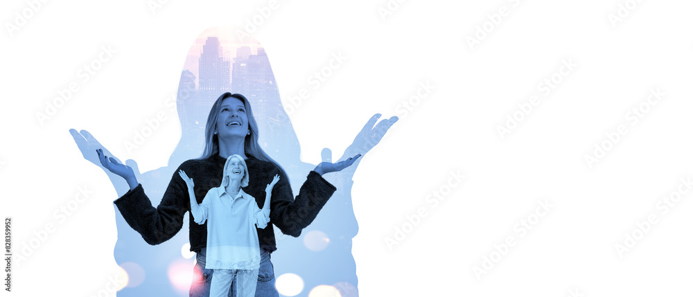 Young women looking up and smiling with hands up silhouette, copy space Young women looking up and smiling with hands up silhouette, copy space