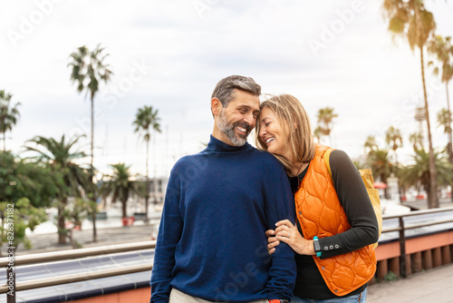Photography Romantic portrait of adult couple bonding with love in the city