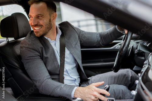 Businessman in suit parking...