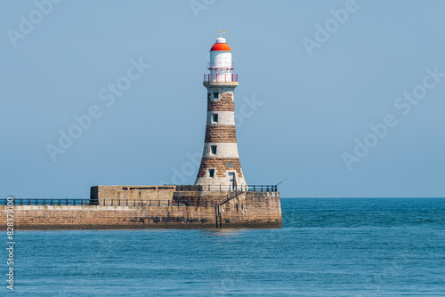 The Lighthouse and pier in Roker, England, UK photo