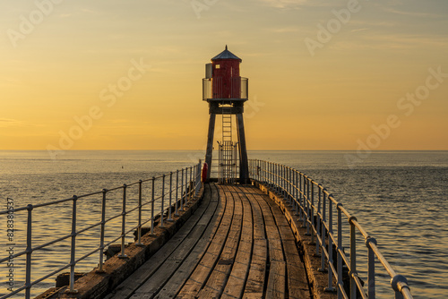 Golden Hour at the East Pier in Whitby, England, UK photo