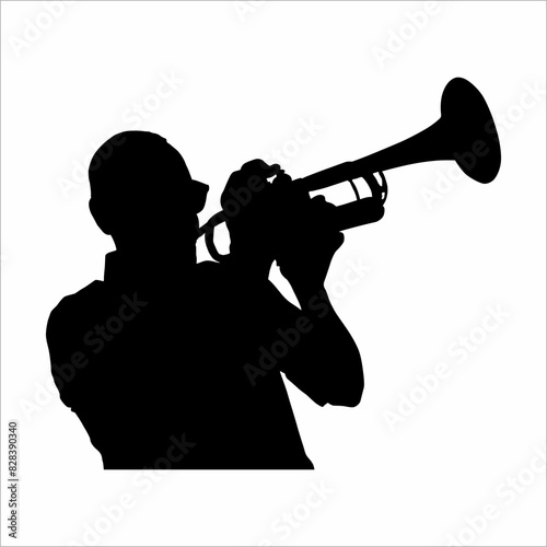 Silhouette of a musician, blowing a trumpet