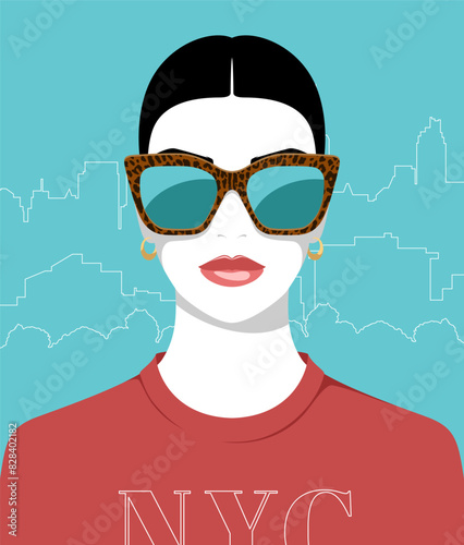 1489_Beautiful woman wearing fashionable large sunglasses against background with silhouette of a big city