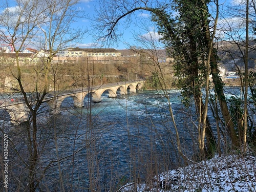 Steinbrücke beim Rheinfall über den Fluss Rhein zwischen Laufen - Uhwiesen und Neuhausen.am Rheinfall - Schweiz photo