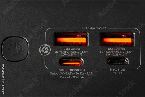 black power bank isolated , input and output ports
