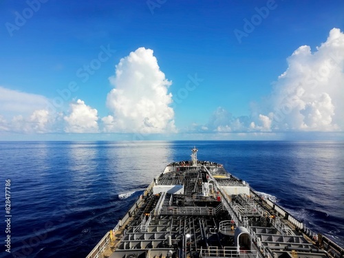 Tanker (tank ship or tankship) ship designed to transport or store liquids or gases in bulk. Types of tankship include oil tanker, chemical tanker, gas carrier. Board of lng tanker sailing in ocean