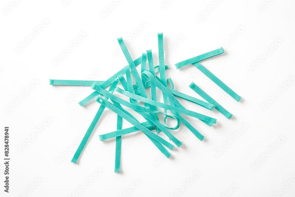 Blue Plastic Straws Scattered on White Background Blue Plastic Straws Scattered on White Background