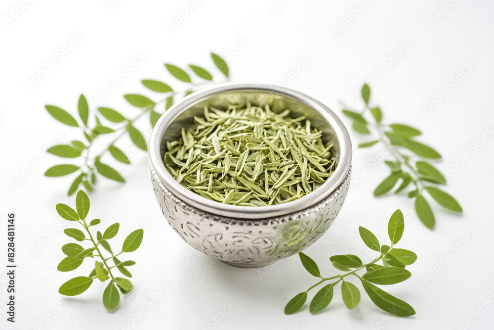 Moringa Leaf Powder in Bowl with Fresh Moringa Leaves Moringa Leaf Powder in Bowl with Fresh Moringa Leaves