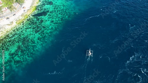 4K Aerial Drone video of unique place of different sea water currents meeting at the south tip of the Cebu island, Liloan, Philippines photo