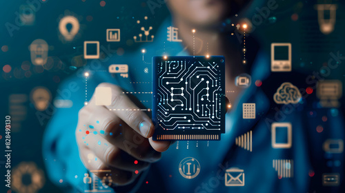 A person holding a tech circuit board with icons, ideal for technology concept designs, website development, and innovationthemed projects. photo