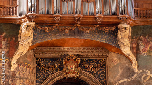 Elaborate pipe organ at the center of Saint Cecile cathedral, Albi, France photo