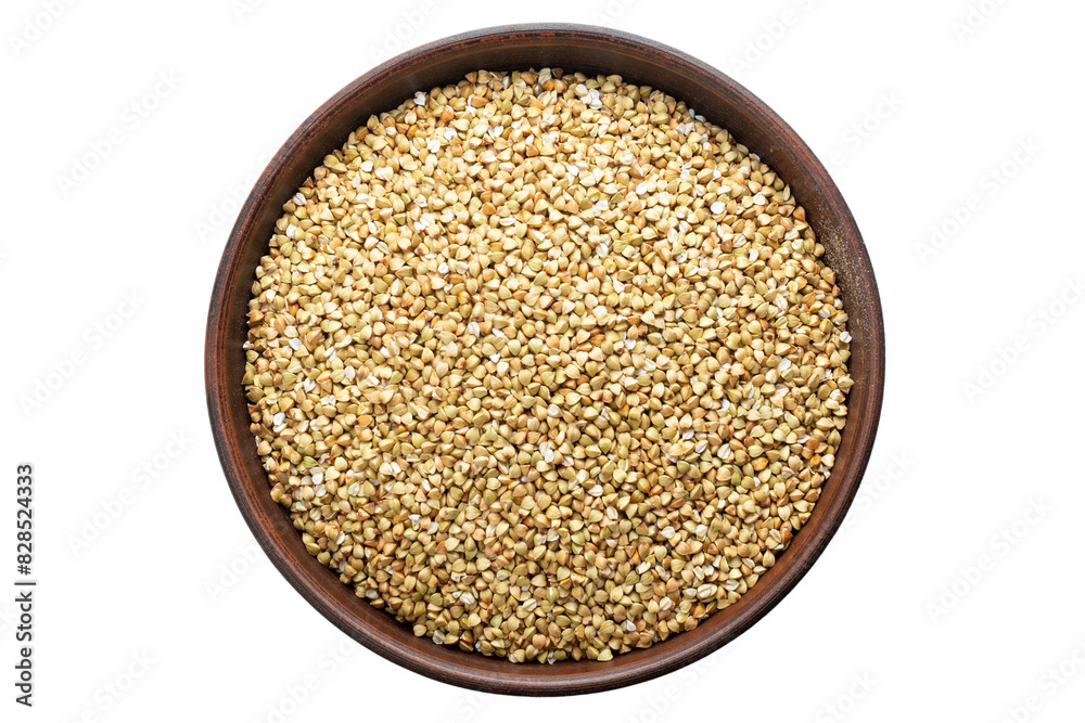 Unroasted buckwheat in a bowl. Isolated on a white background. Unroasted buckwheat in a bowl. Isolated on a white background.